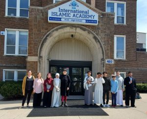 Students in front of school.